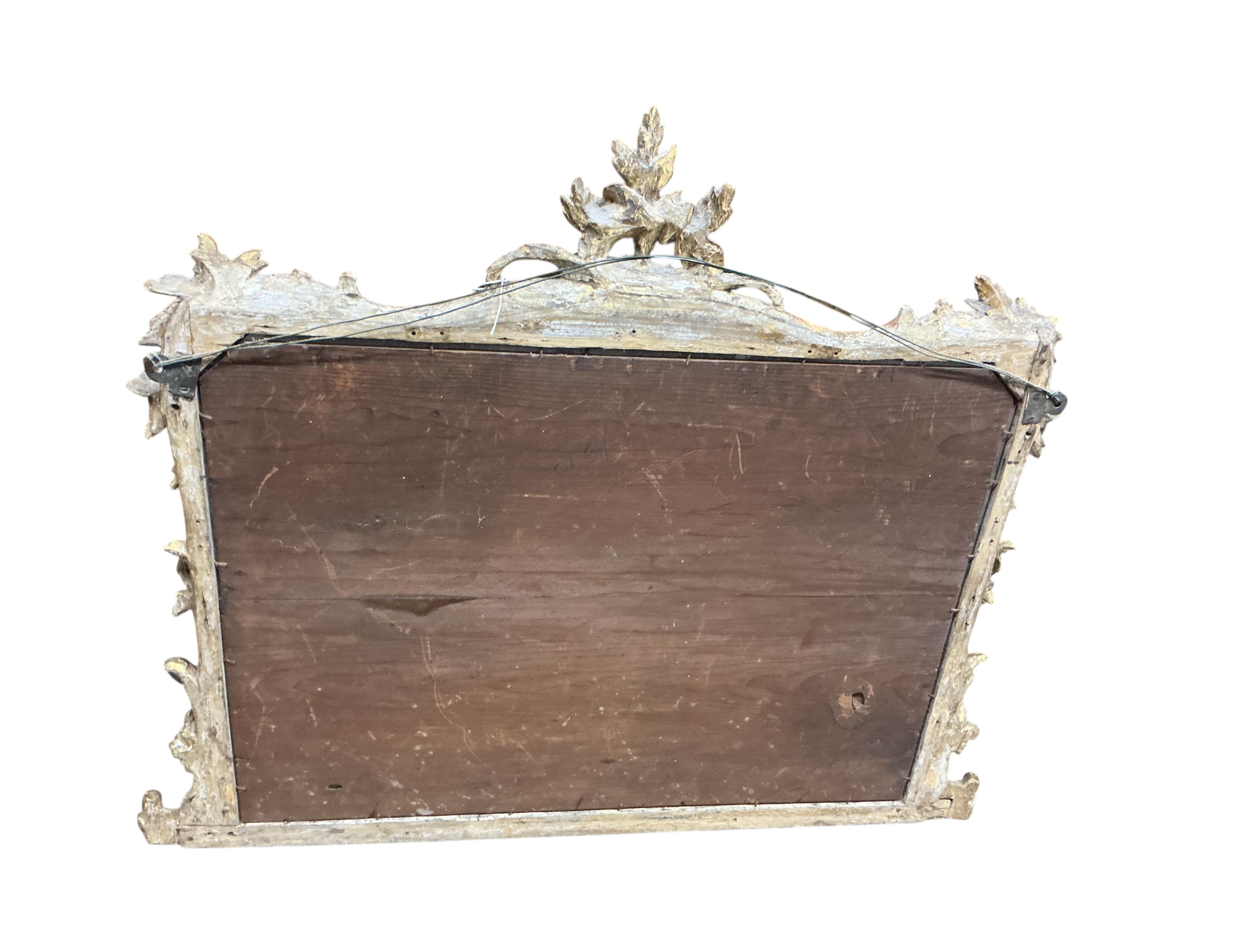 A 19th century carved giltwood and composition wall mirror, width 90cm, height 75cm